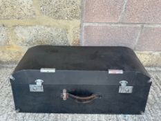 A sloping fronted and backed car trunk.