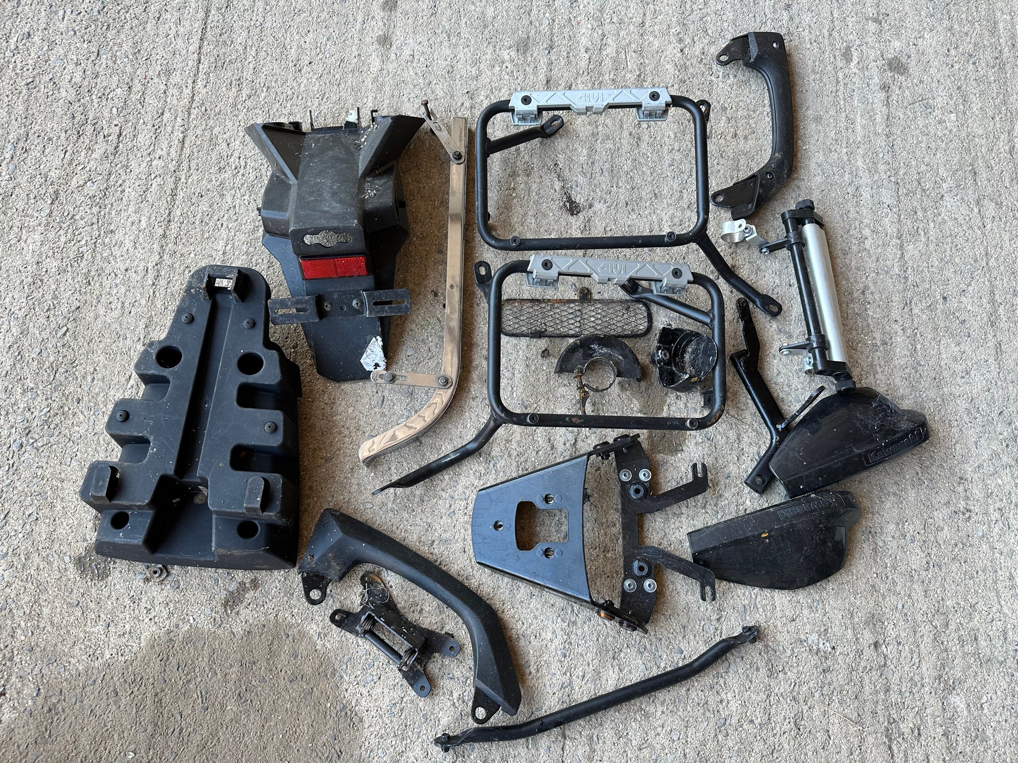 A quantity of Kawasaki Versys parts.