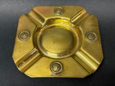 A CAV branded square brass ashtray.