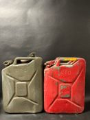 Two War Department jerry cans, one dated 1945, with spout, the second dated 1952.