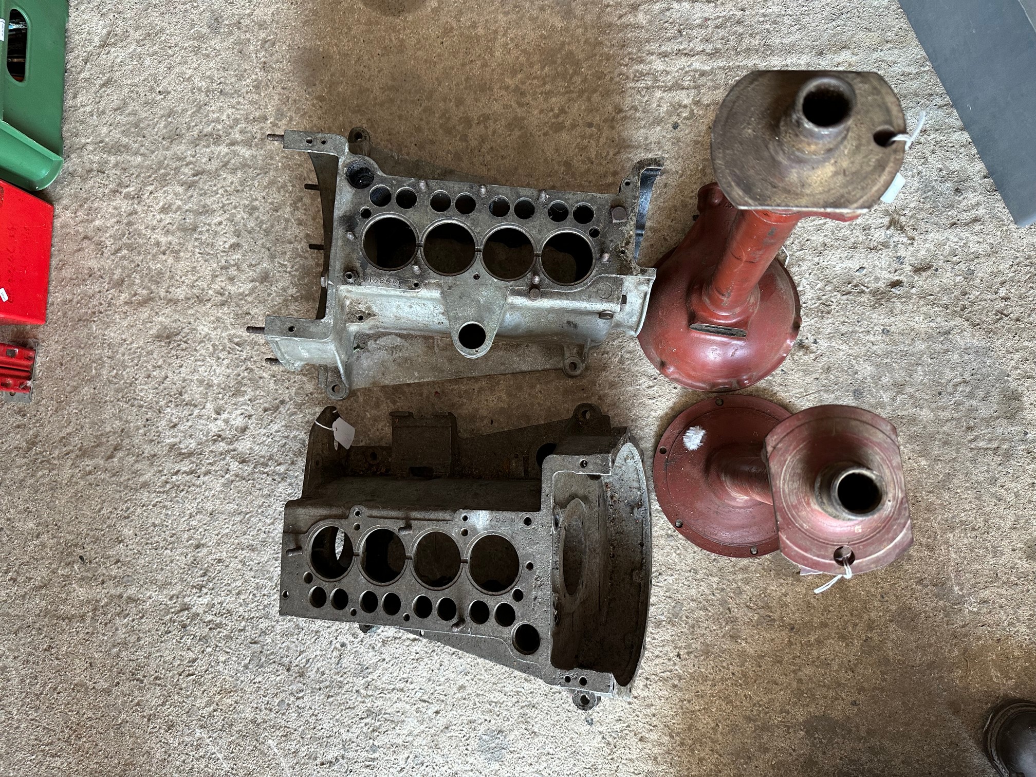Two Austin 7 crankcases, one for a mag engine, no. M36400, plus a rear axle casing.