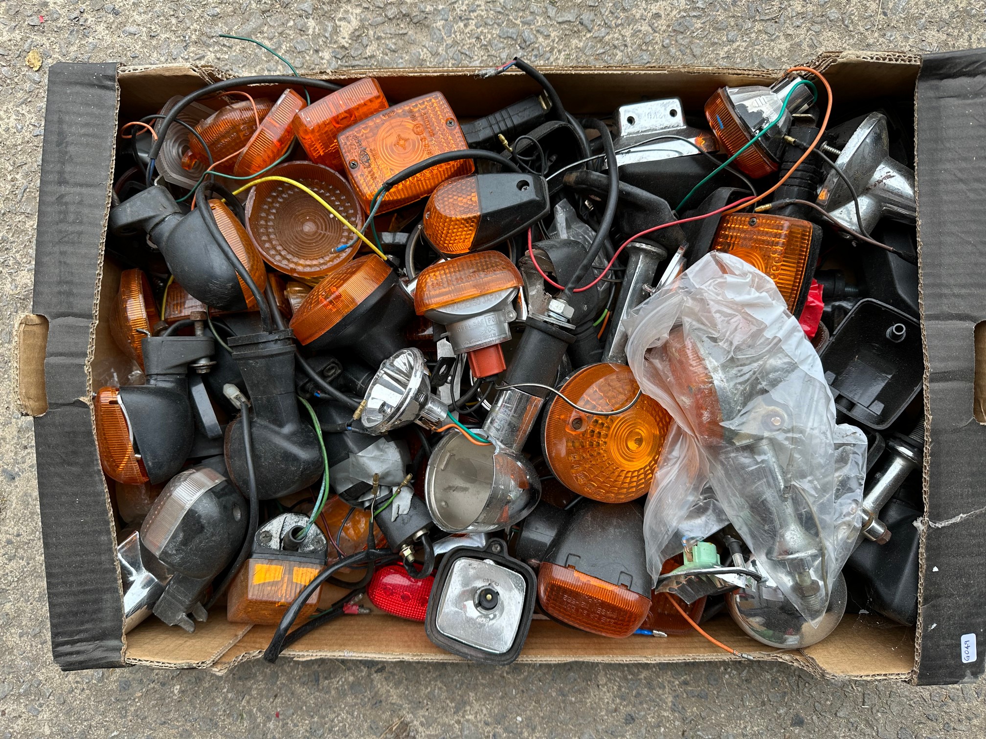 A tray of motorcycle indicators.