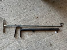 Two garage or shop hanging sign brackets.