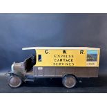 A well-constructed wooden scale model of a circa 1920s delivery van in GWR Express Cartage