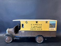 A well-constructed wooden scale model of a circa 1920s delivery van in GWR Express Cartage