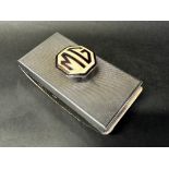 An MG chrome plated blotter.