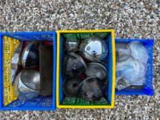 Two crates of headlamps plus a tray of headlamp glass.