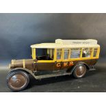 A well-constructed wooden scale model of a circa 1920s bus in GWR livery, 18" long.