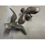 A good quality nickel plated car accessory mascot in the form of an owl with its wings outstretched,