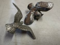 A good quality nickel plated car accessory mascot in the form of an owl with its wings outstretched,