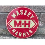 A circular Massey Harris aluminium advertising sign, 21" diameter.