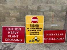 Three modern construction site warning signs.