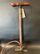 A Talbot London brass stirrup pump.