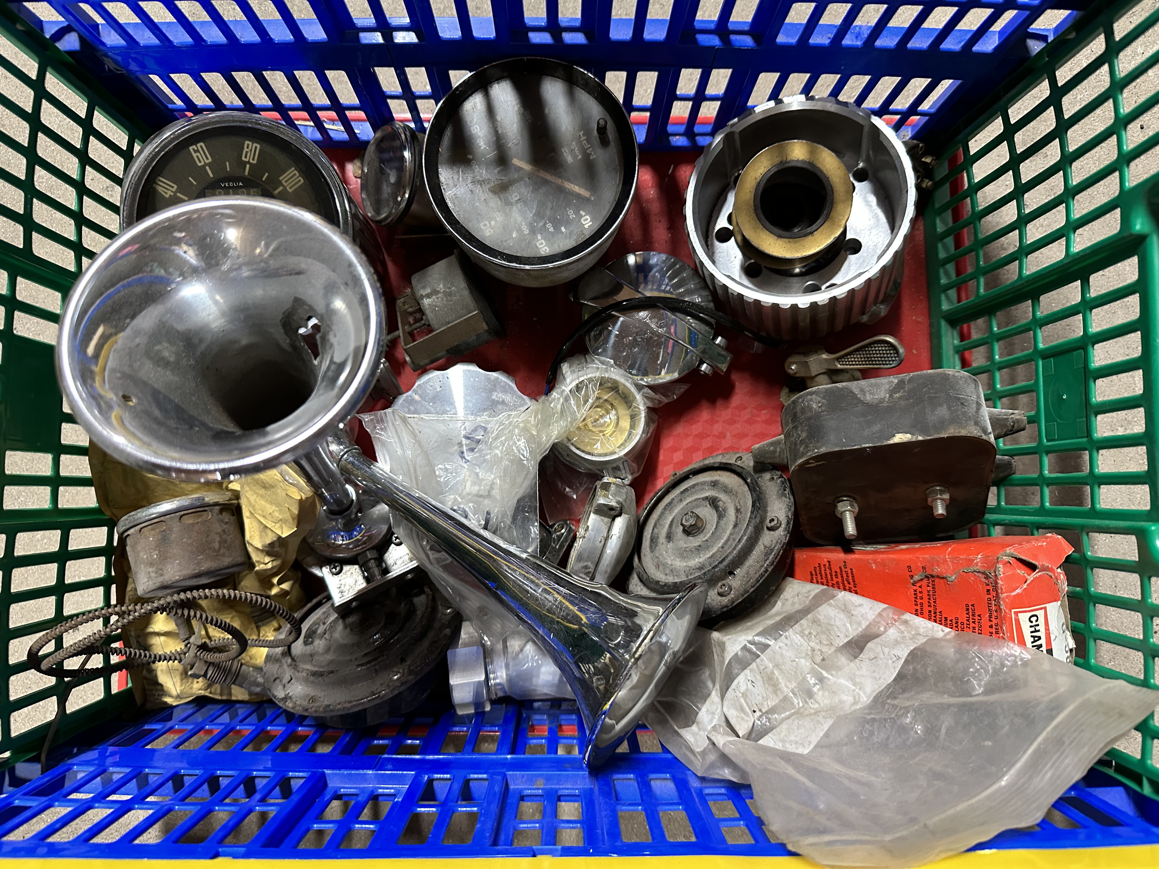 A selection of assorted spares including carburettor etc.