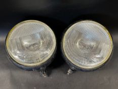 A pair of Cibie driving lamps.