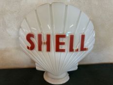 A Shell glass petrol pump globe by Hailware, fully stamped underneath, chips to neck, by repute this