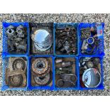 An autojumbler's lot in eight trays of various parts including crown wheels and pinions,