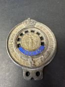 An Autocycle Union RAC Associate badge with enamel year date 1924-25.