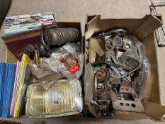 Two boxes of assorted spares including a partial Vauxhall 30/98 switch panel, Lucas bulb holders,