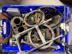 Three boxes of various motorcycle parts.