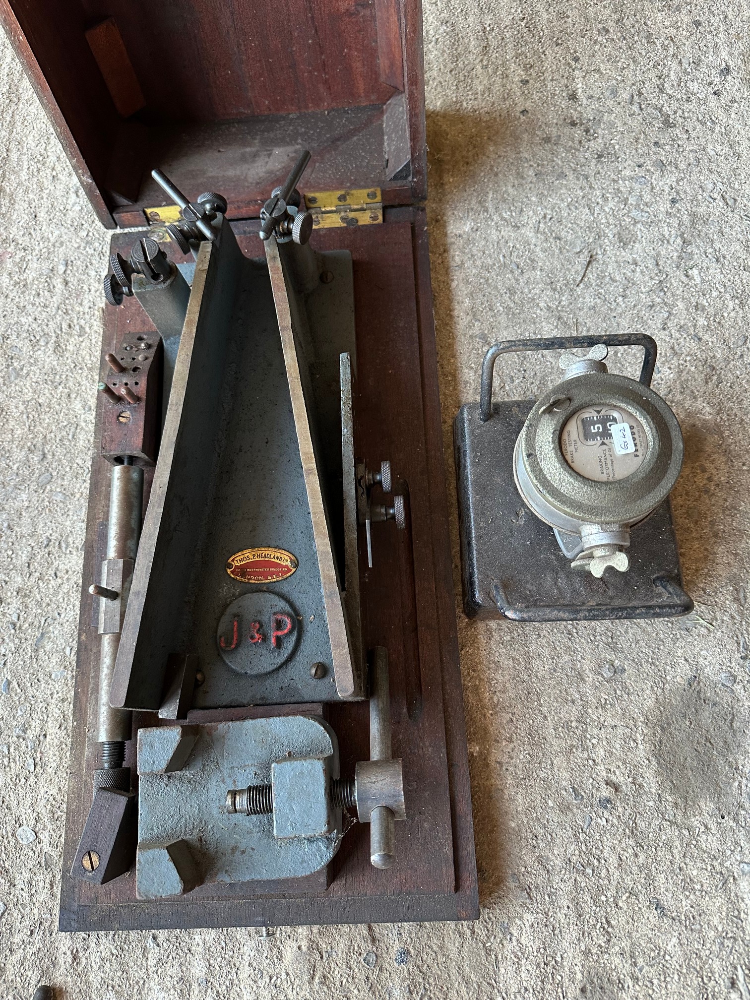 A boxed workshop tool by Thos. P. Headland Ltd, possibly for straightening con rods., plus a