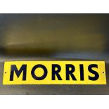 A small enamel sign bearing the name Morris, bright gloss, 22 x 5".