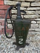 An old garage 'Gear Oil' dispenser.