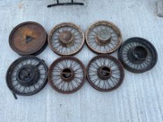 A selection of pre-war motor car wheels.