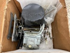 A boxed Holley hi-performance carburettor.