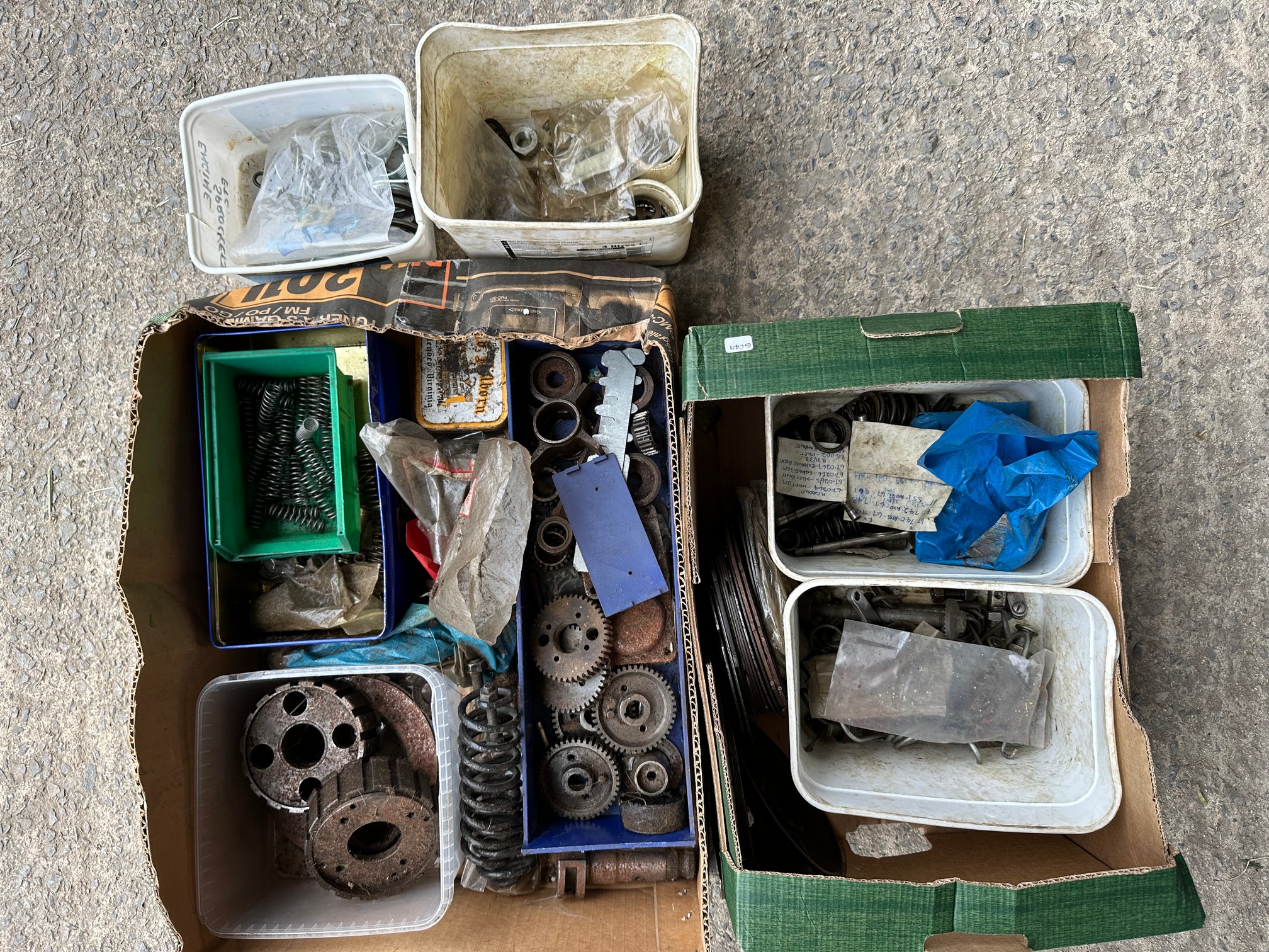 A box of BSA engine and gearbox spares, various A7 valves, clutch parts etc.