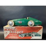 A rare clockwork tinplate model of an MG Magic Midget by Lines Bros. Ltd (Tri-ang Bros.), with