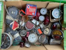 A good box of car parts including speedometers, lights, switches etc.