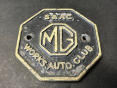 An MG Works Auto Club circular badge.