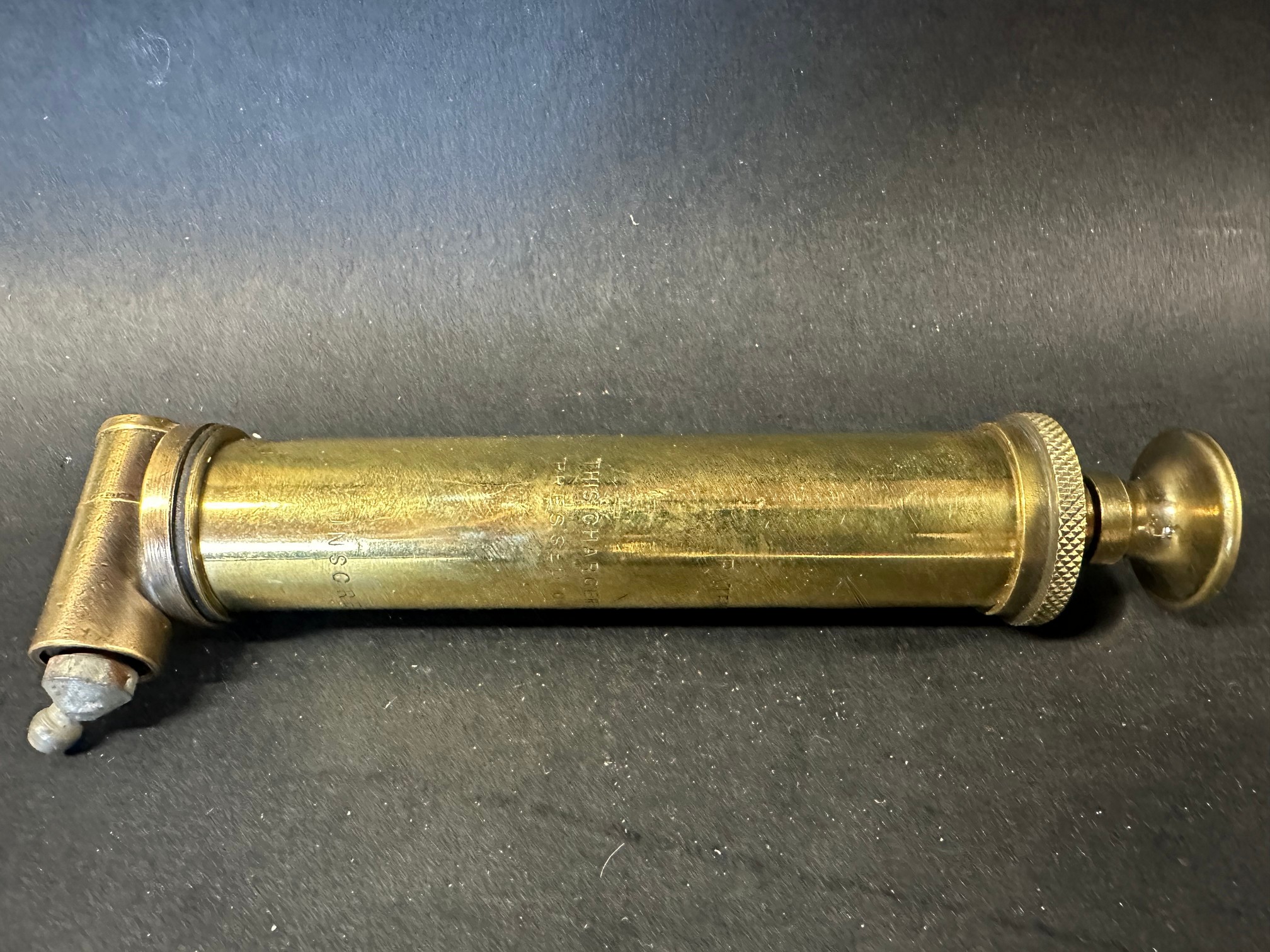 A good quality brass Jeavons spring gaiter greaser, 6 1/4" long.