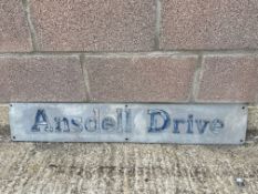 A metal road sign for Ansdell Drive, 42 x 7".