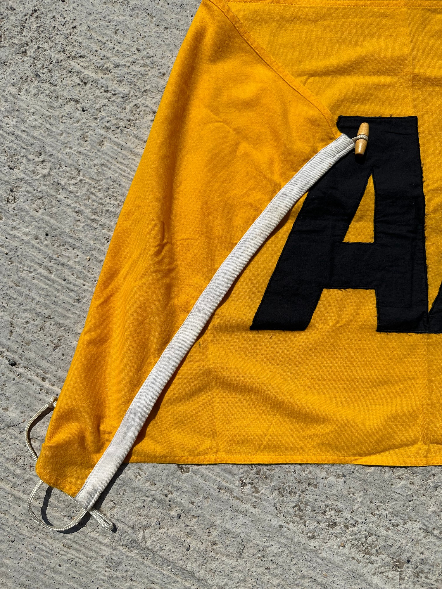 An AA appliqued flag circa late 1960s/early 1970s, 42 1/2 x 24 1/2". - Image 2 of 2