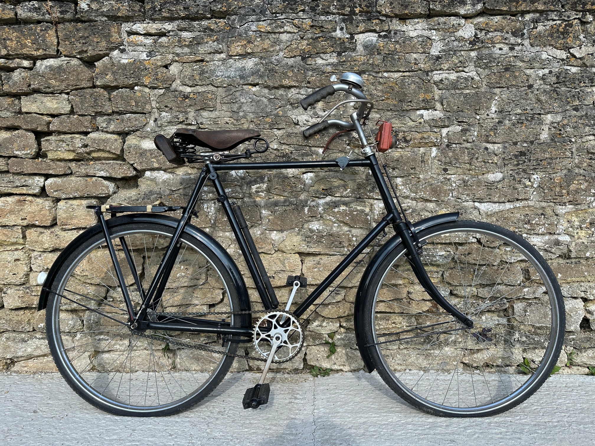 A tall policeman's bicycle with Sturmey-Archer rear hub and Brooks leather saddle.
