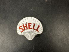 A Shell enamel lapel badge in good condition, stamped Gaunt.