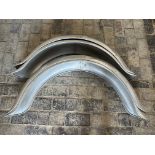 A set of four alloy mudguards.