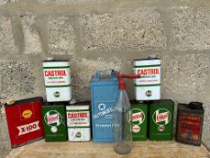 A quantity of oil cans including Castrol, also an Exide battery filler bottle etc.