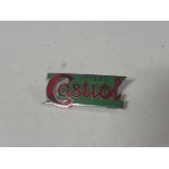 A Castrol badge: Patent Castrol.
