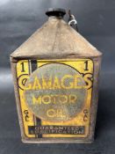 A rare Gamages Motor Oil one gallon pyramid can with cap.
