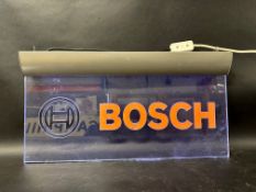 A Bosch perspex light up sign, 23 3/4" x 12 1/4".