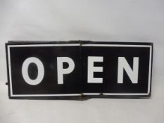An enamel sign with hinge to flip between Open and Closed, 16 1/2 x 6 1/2".