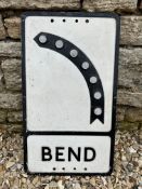A Bend (in road) pressed aluminium road sign with reflectors, 12 x 21".