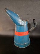 A half gallon blue painted oil pourer with red band, possibly Redline.