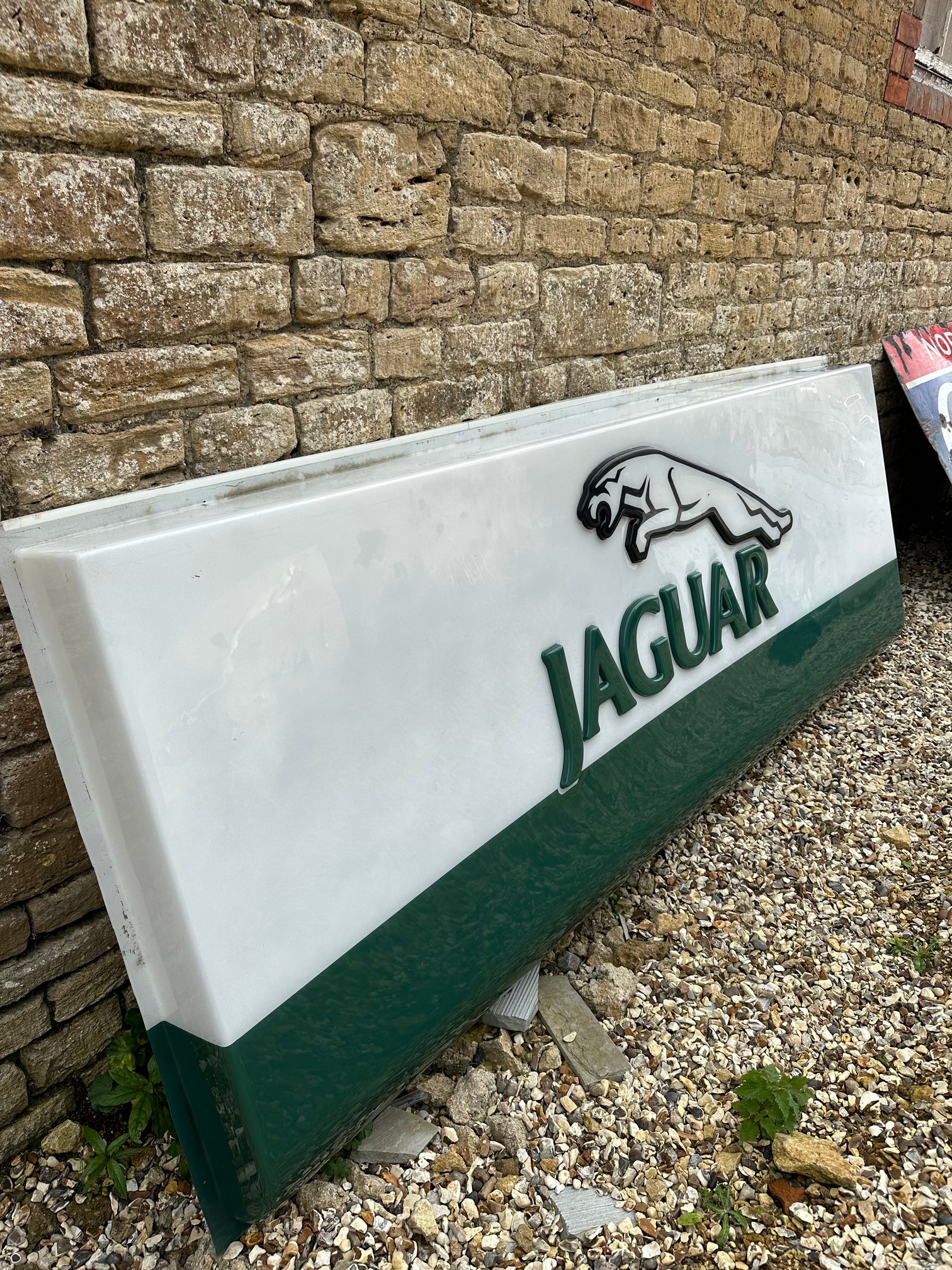 A large Jaguar dealership acrylic advertising sign panel with raised logo and lettering, damage to - Image 6 of 6