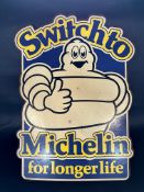A rare 'Switchto Michelin' tyres pictorial hardboard advertising sign, 30 1/2 x 41".