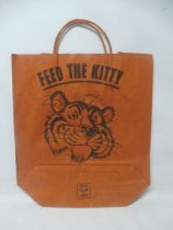 An original Esso paper gift abg featuring an illustration of the Esso Tiger's head to both sides,