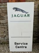 A large Jaguar Service Centre dealership wall sign with illuminated lettering. 35 1/2 x 70 3/4".